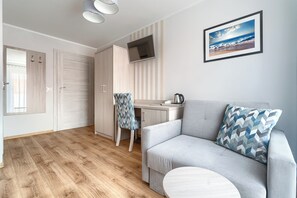 Quarto triplo | Ferros/tábuas de passar roupa, Wi-Fi de cortesia, roupa de cama