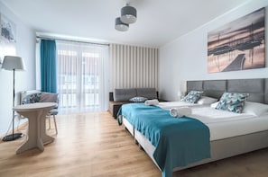 Quarto triplo | Ferros/tábuas de passar roupa, Wi-Fi de cortesia, roupa de cama
