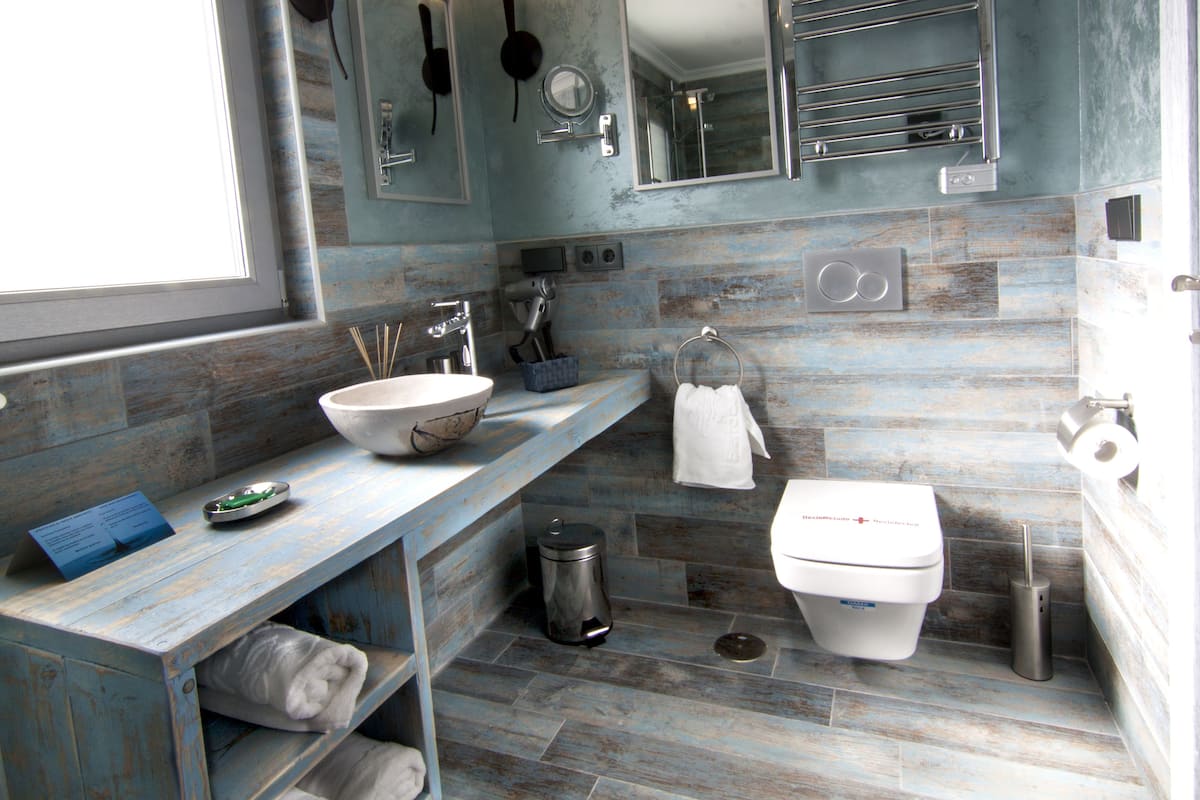 double room (sierra puig campana) | bathroom | shower, free toiletries, hair dryer, slippers