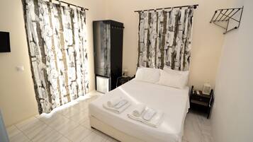 Double or Twin Room | Blackout drapes, iron/ironing board, free WiFi, bed sheets