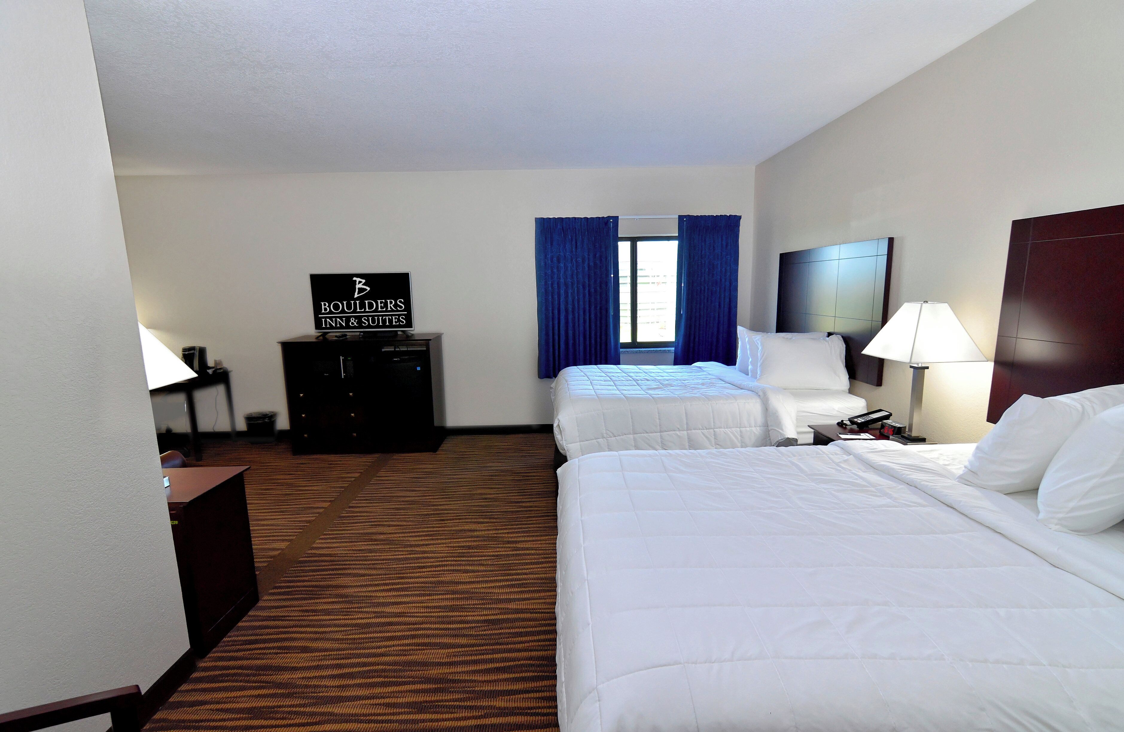 premium bedding, desk, laptop workspace, blackout curtains