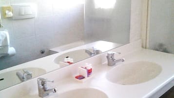 Shower, free toiletries, hair dryer