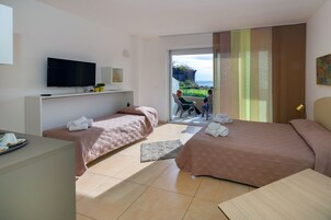 Panoramic Triple Room, Sea View | Egyptian cotton sheets, premium bedding, down comforters, minibar