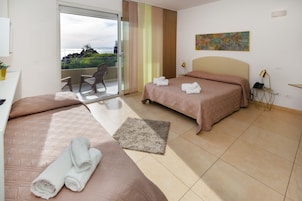 Panoramic Triple Room, Sea View | Egyptian cotton sheets, premium bedding, down comforters, minibar