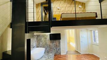 Suite Premium | Camas con efecto memoria, minibar y caja de seguridad en la habitación