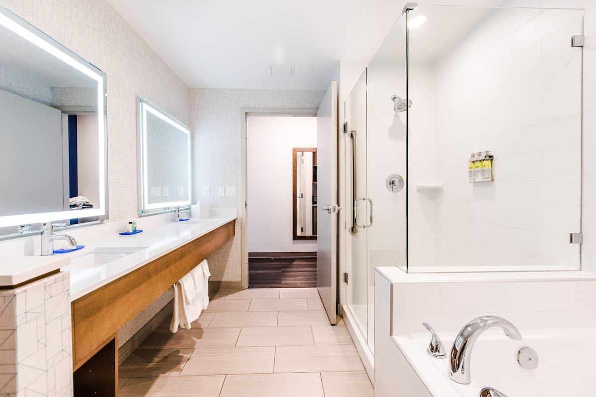 Suite, 1 King Bed, Jetted Tub | In-room safe, desk, blackout curtains, soundproofing