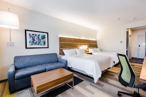 A hotel room with a bed, a sofa, a desk, and a chair. - Holiday Inn Express & Suites West Edmonton - Mall Area by IHG (Edmonton)