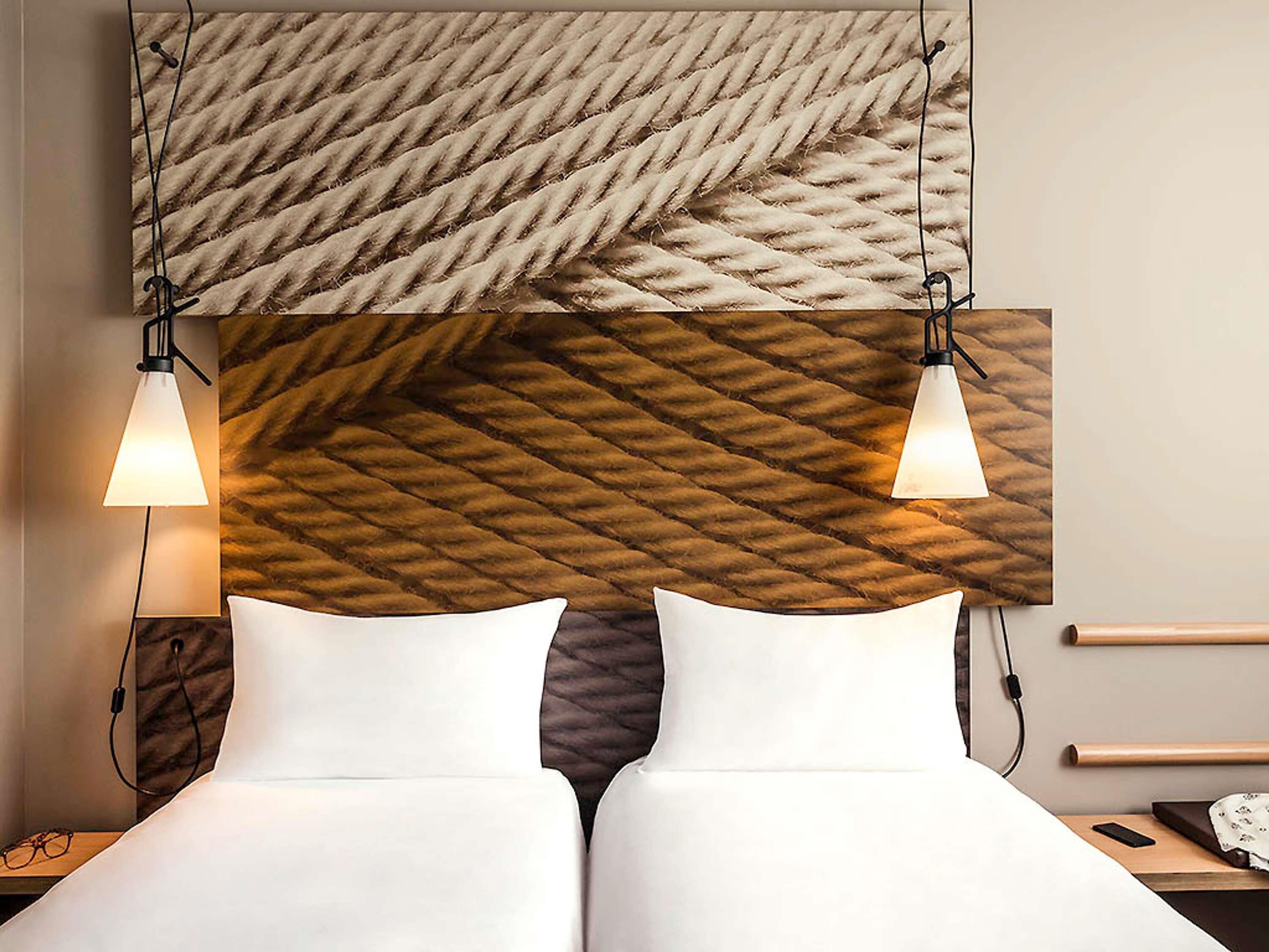 Premium bedding, desk, laptop workspace, blackout drapes