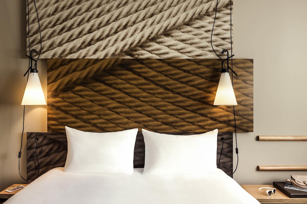 premium bedding, desk, laptop workspace, blackout curtains