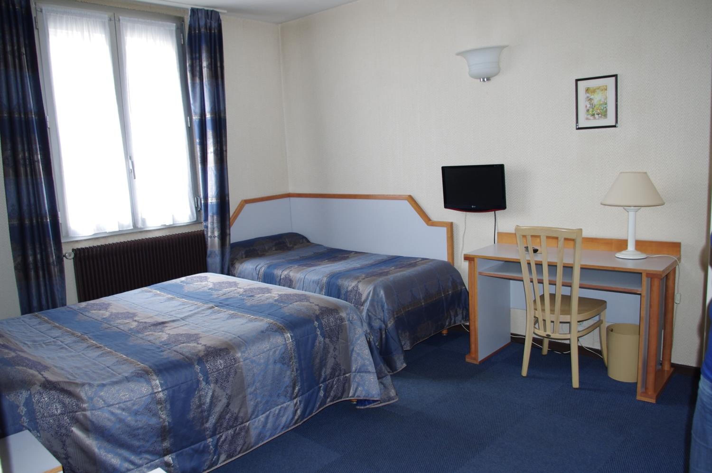 individually decorated, individually furnished, desk, blackout curtains