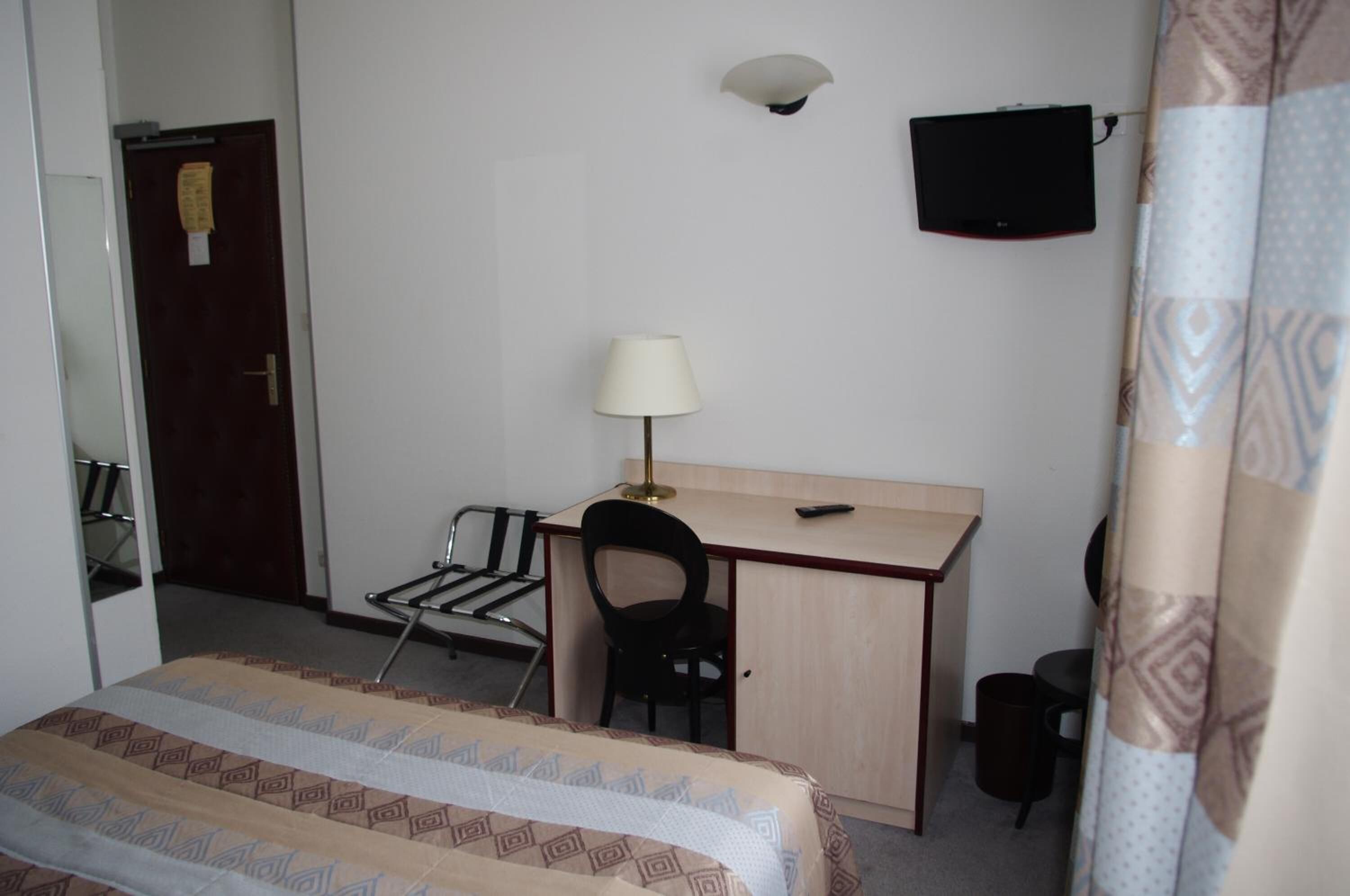 individually decorated, individually furnished, desk, blackout curtains