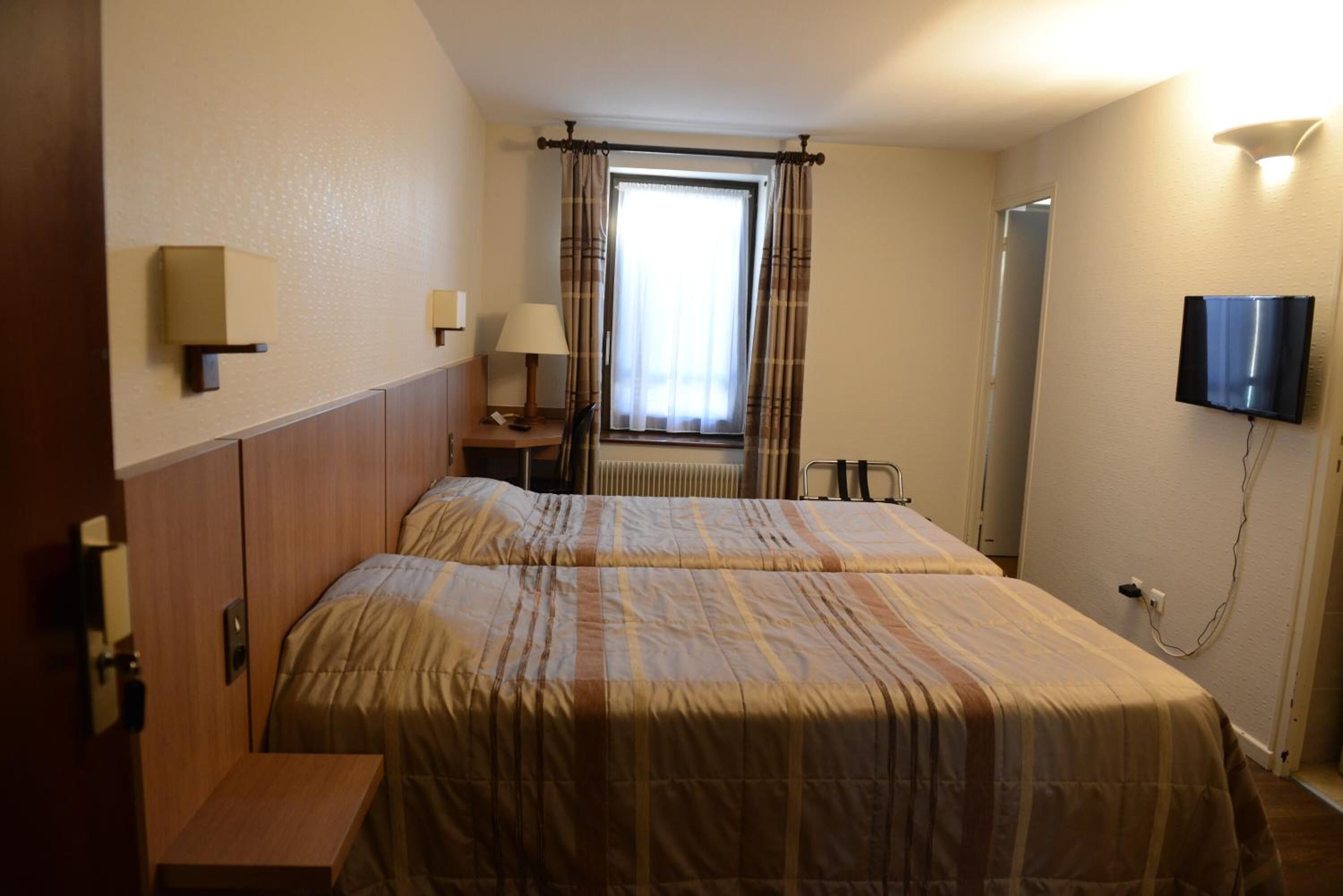 individually decorated, individually furnished, desk, blackout curtains