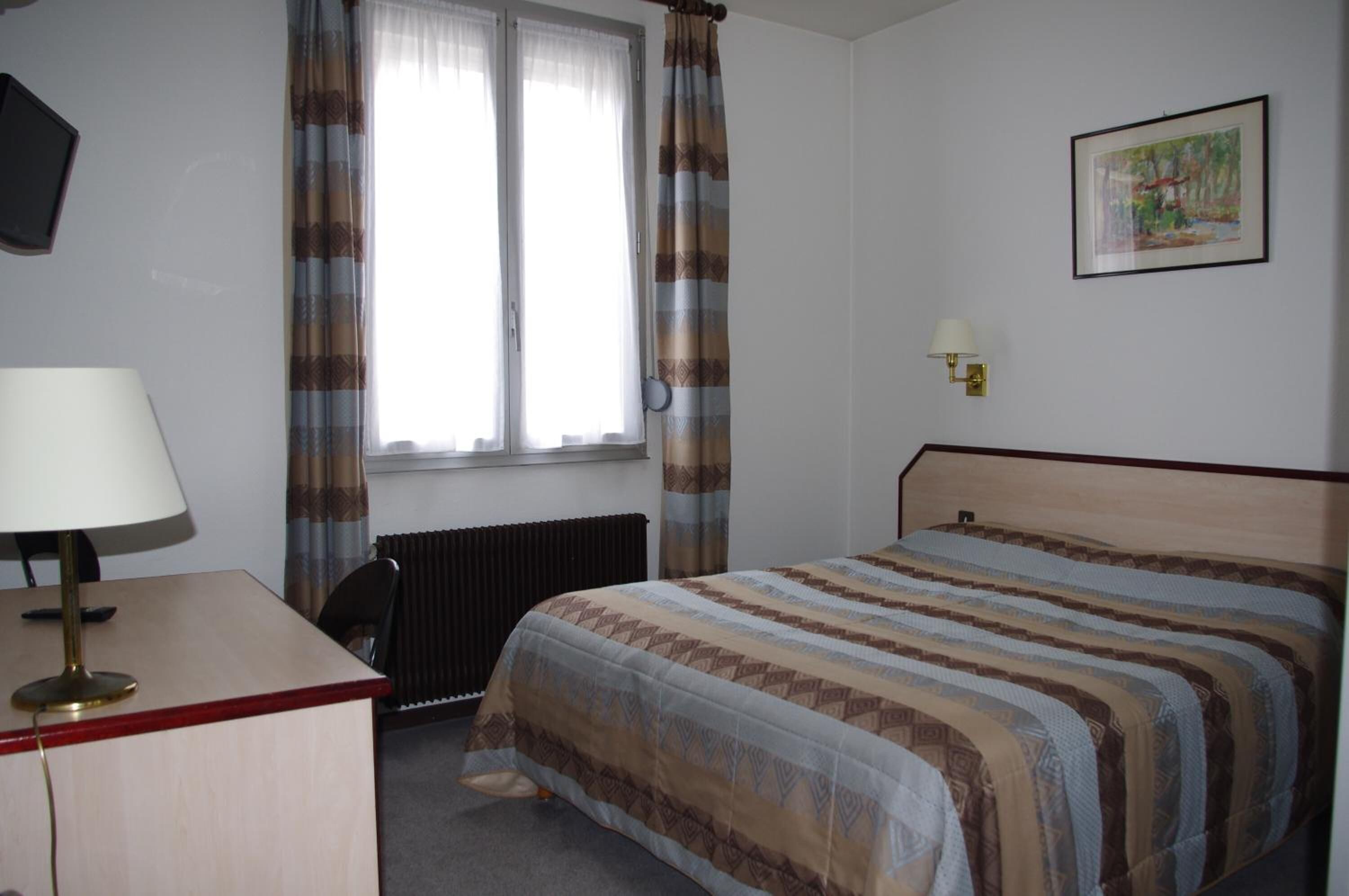 individually decorated, individually furnished, desk, blackout curtains