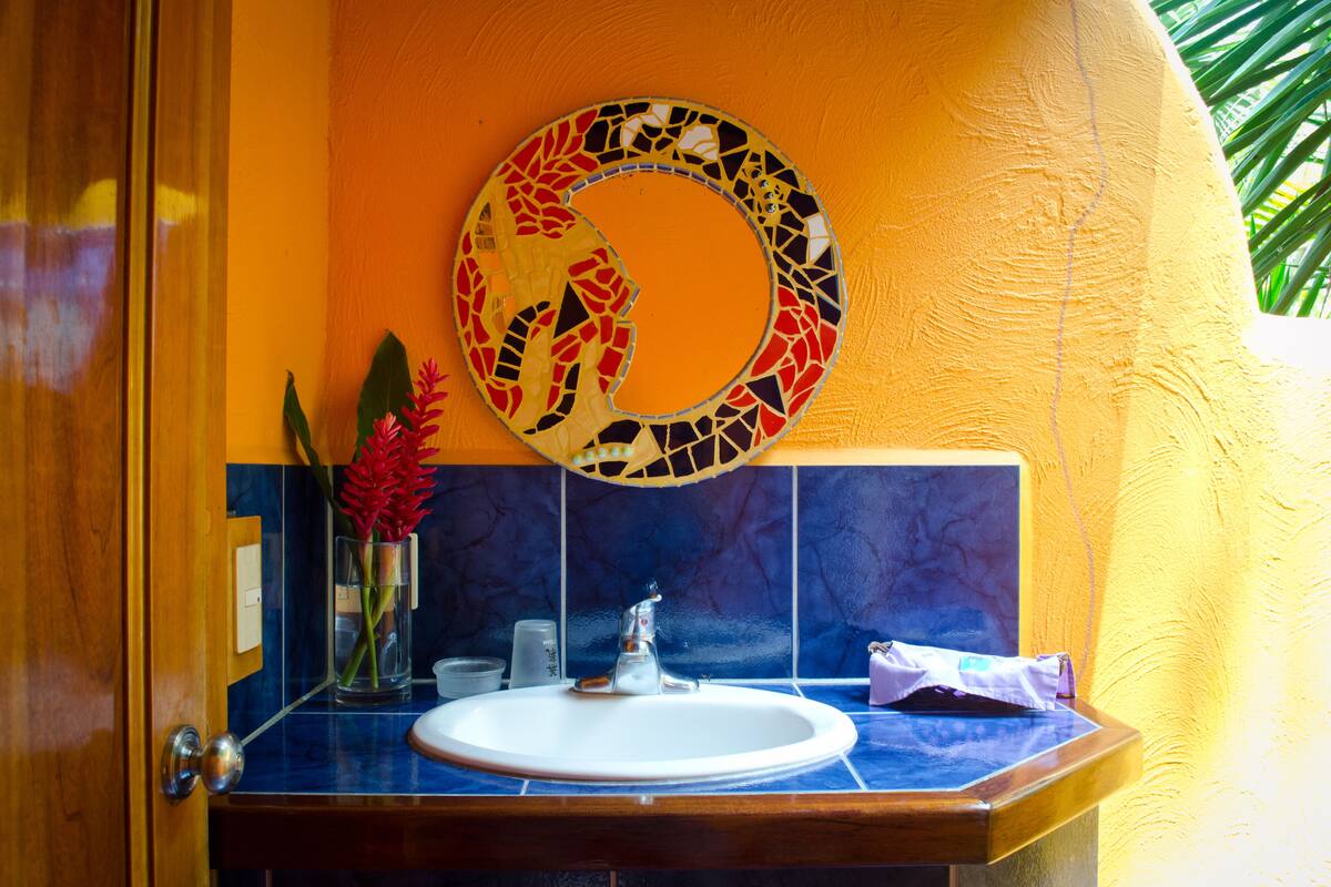 deluxe villa, 1 king bed | bathroom | shower, rainfall showerhead, designer toiletries, hair dryer