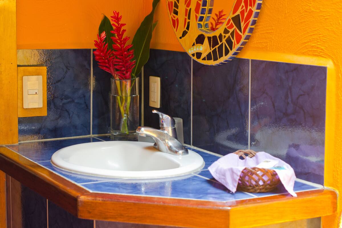 deluxe villa, 1 king bed | bathroom | shower, rainfall showerhead, designer toiletries, hair dryer