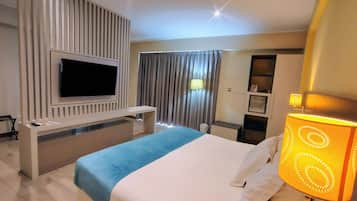 Superior Suite, 1 King Bed, Balcony | Minibar, in-room safe, desk, laptop workspace