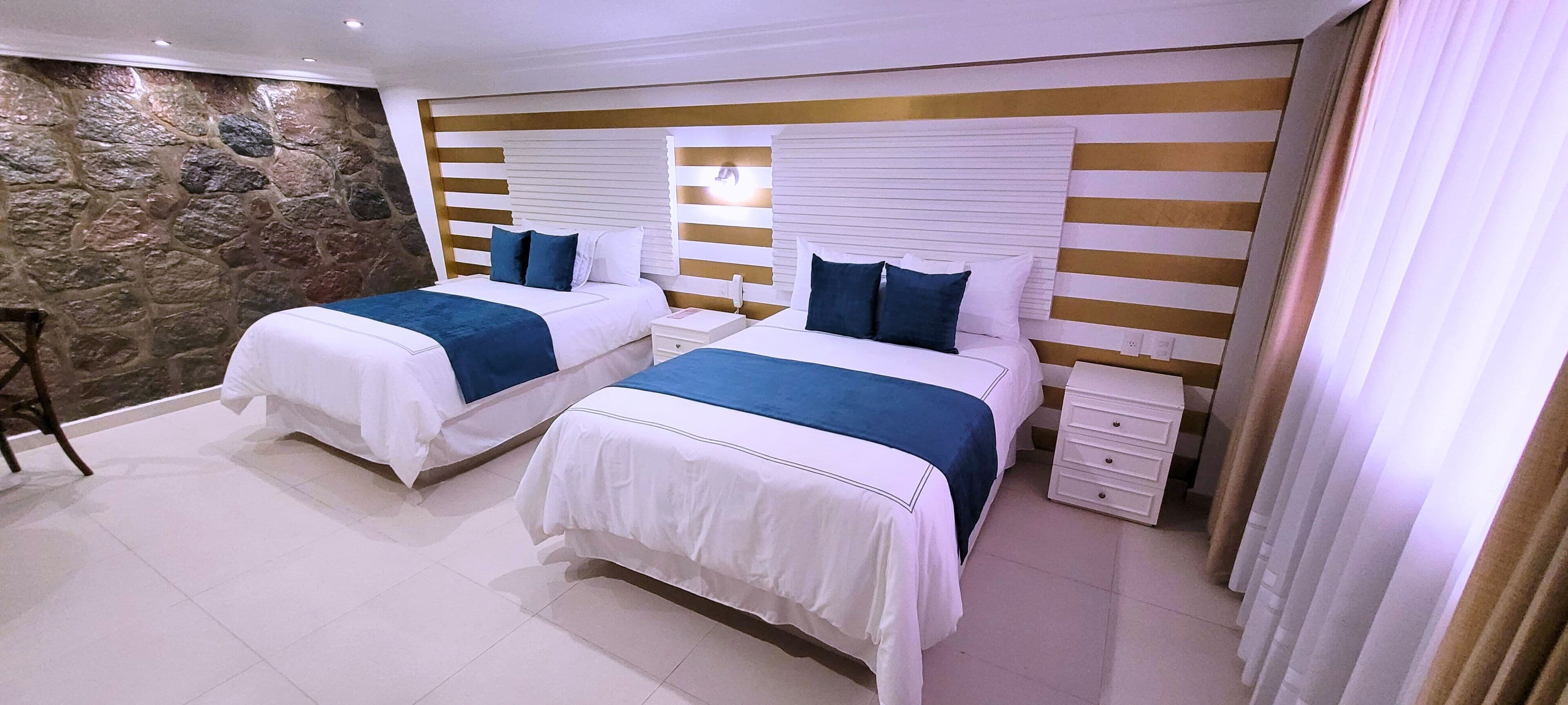 superior room | premium bedding, down duvets, individually decorated