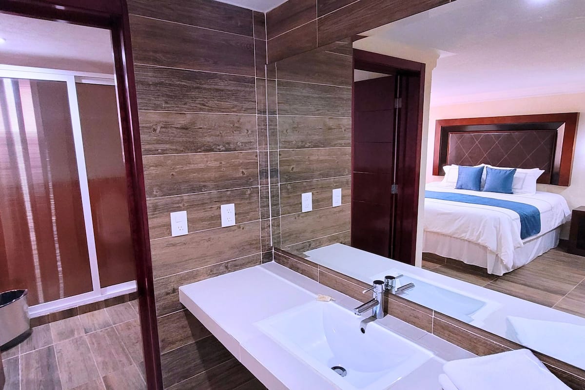 deluxe room | premium bedding, down duvets, individually decorated