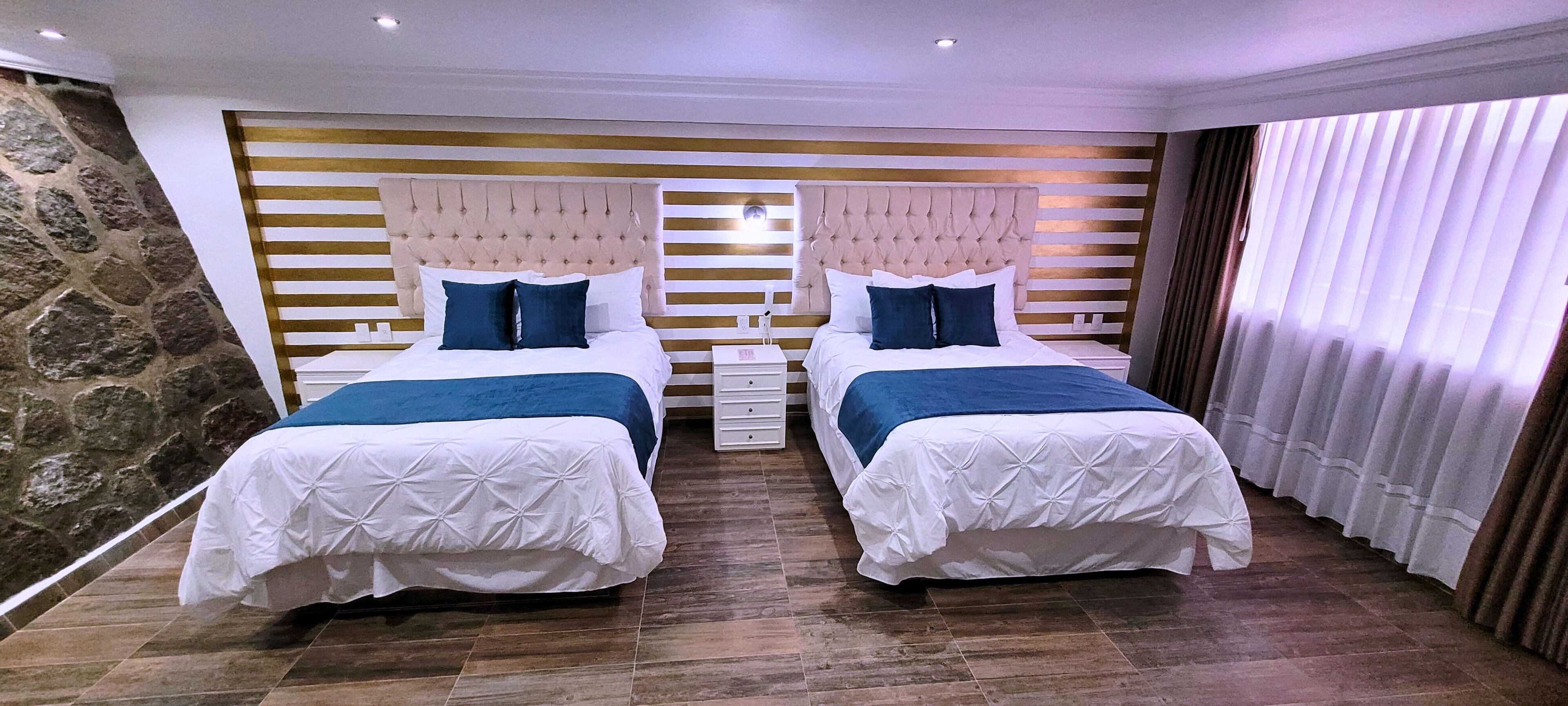 superior room | premium bedding, down duvets, individually decorated