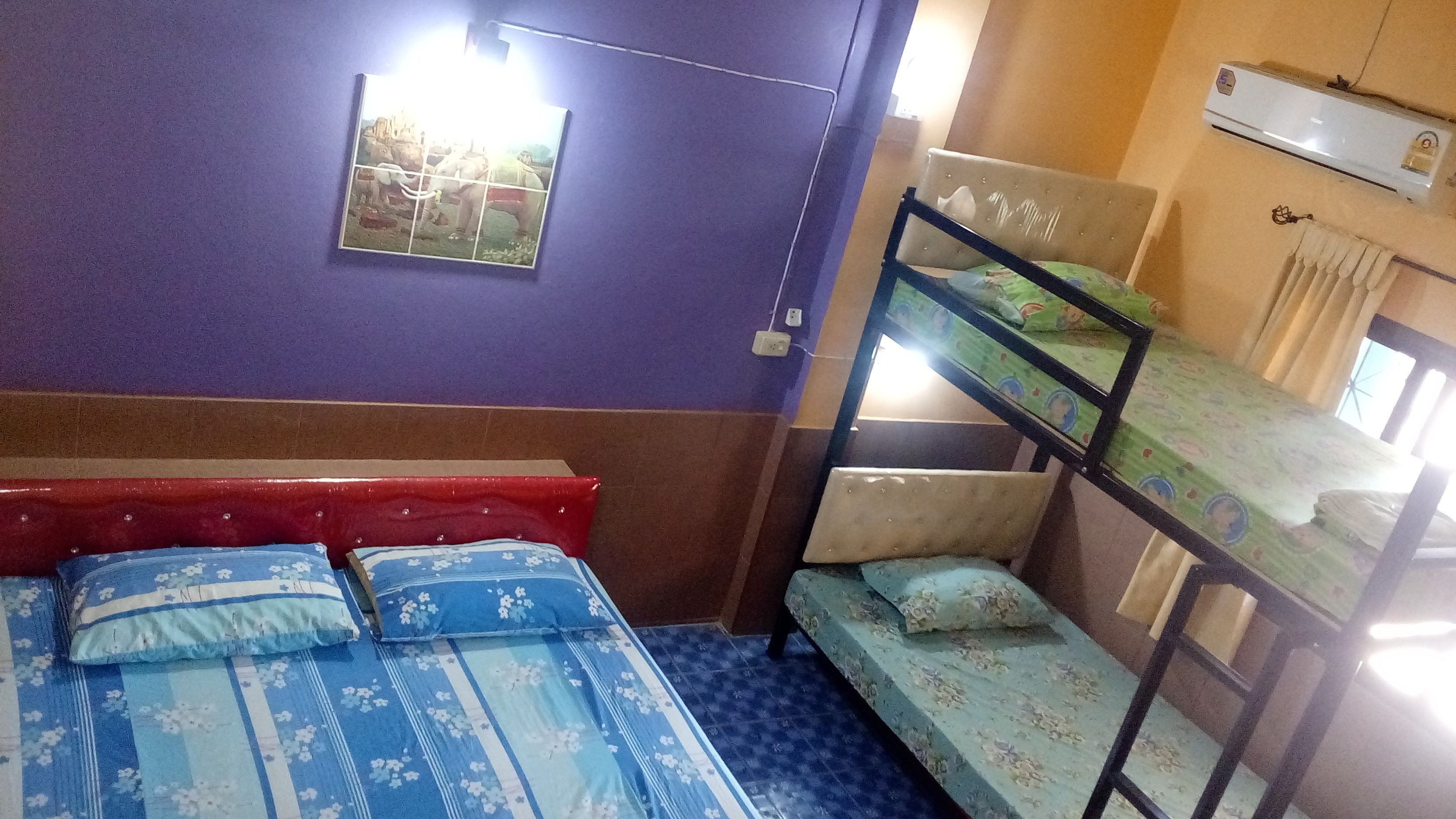 family quadruple room, multiple beds, city view | desk, free wifi, bed sheets