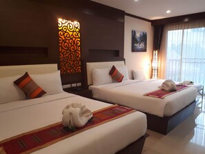 Family Suite, Pool View | 1 bedroom, minibar, in-room safe, desk
