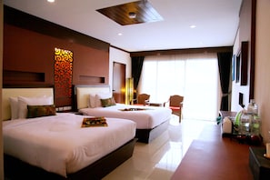 Family Suite, Pool View | Minibar, in-room safe, desk, iron/ironing board - Chivatara Resort & Spa Bang Tao Beach (Choeng Thale)