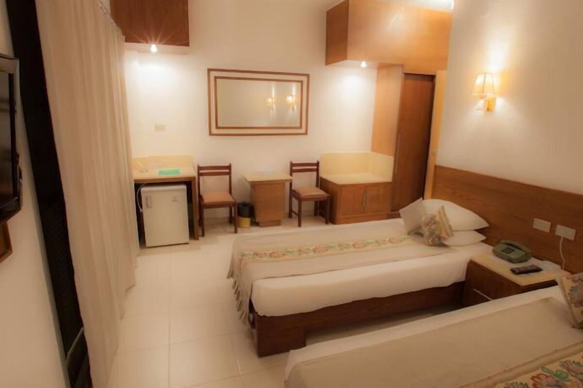 Family Room, 2 Bedrooms, Partial Sea View | Minibar, WiFi, bed sheets