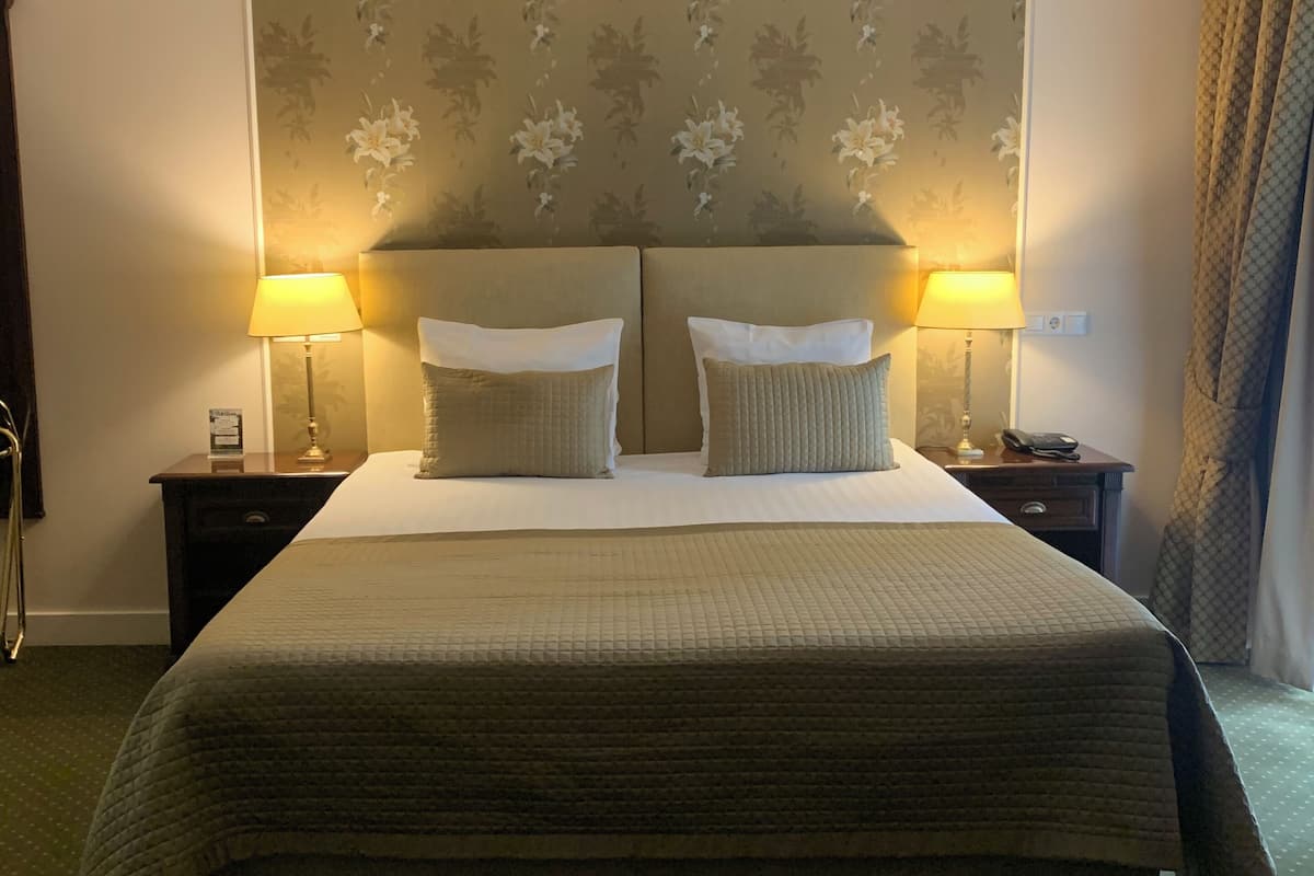 junior suite | minibar, in-room safe, desk, iron/ironing board