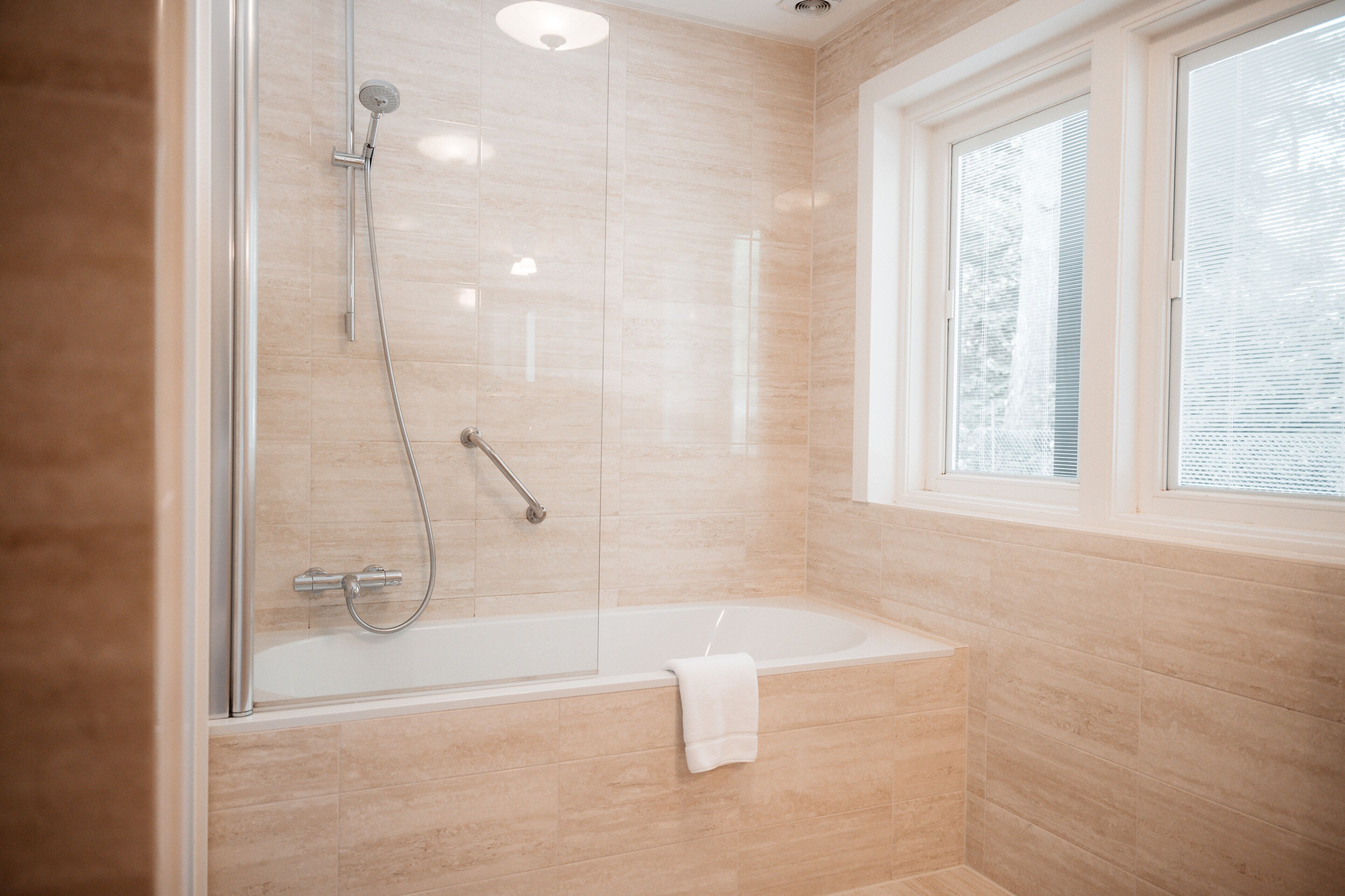 deluxe room | bathroom | free toiletries, hair dryer, towels, soap