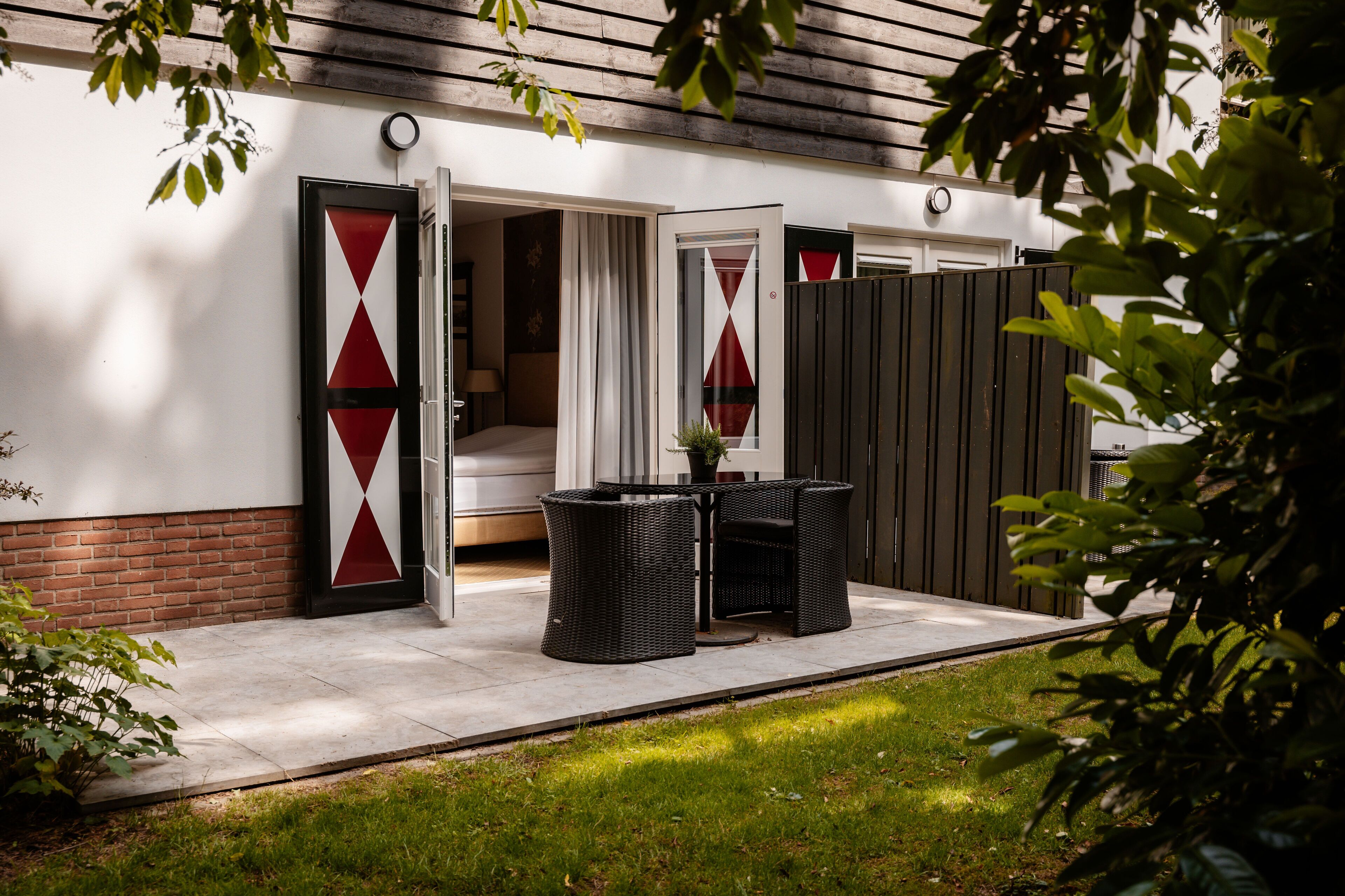 junior suite | minibar, in-room safe, desk, iron/ironing board