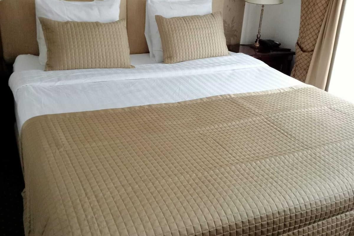 junior suite | minibar, in-room safe, desk, iron/ironing board