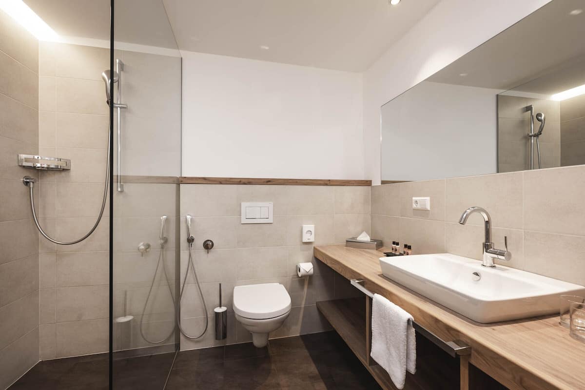 comfort double room, valley view | bathroom | shower, free toiletries, hair dryer, slippers