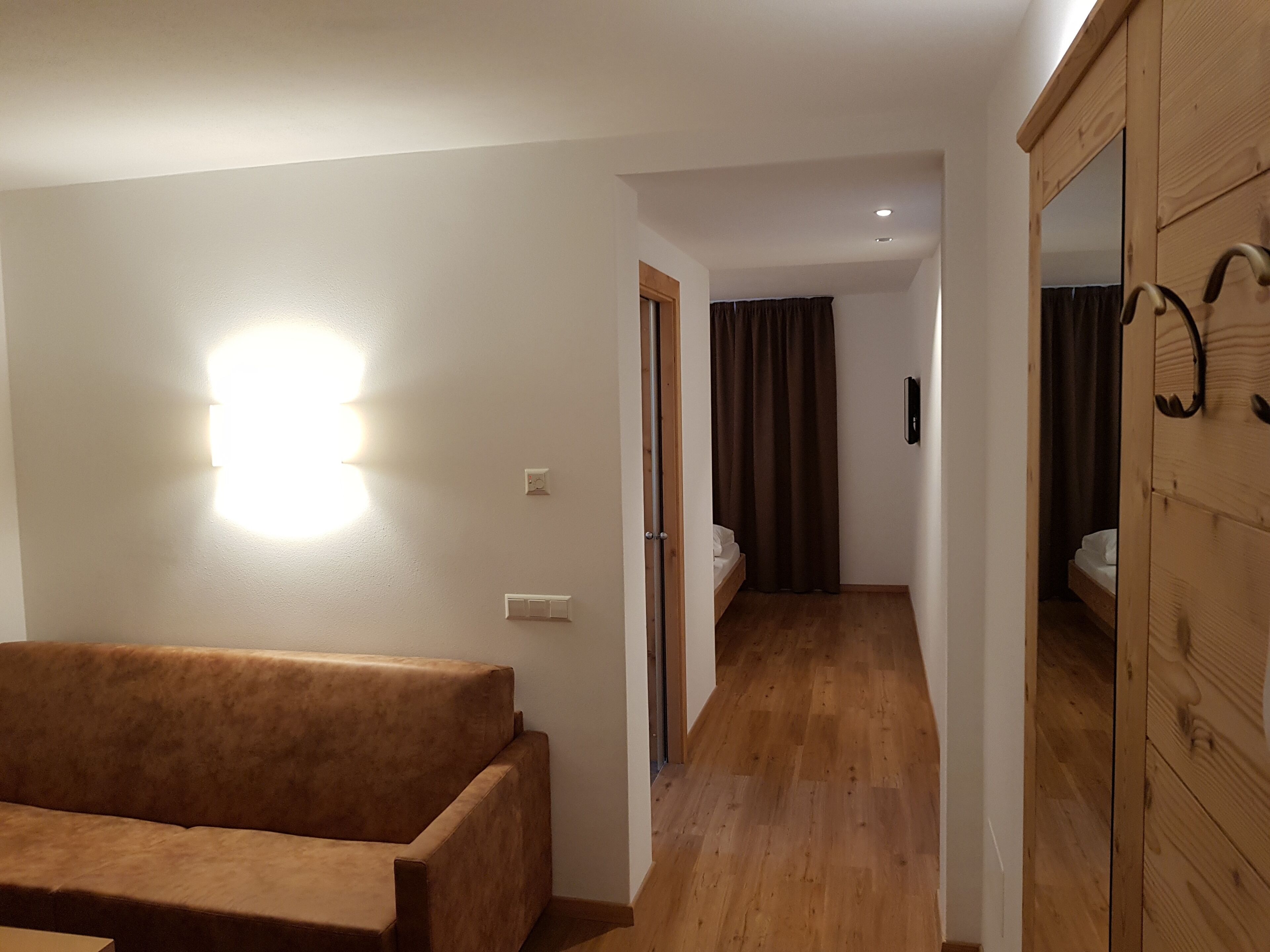 junior suite, mountain view, garden area | in-room safe, desk, laptop workspace, blackout curtains