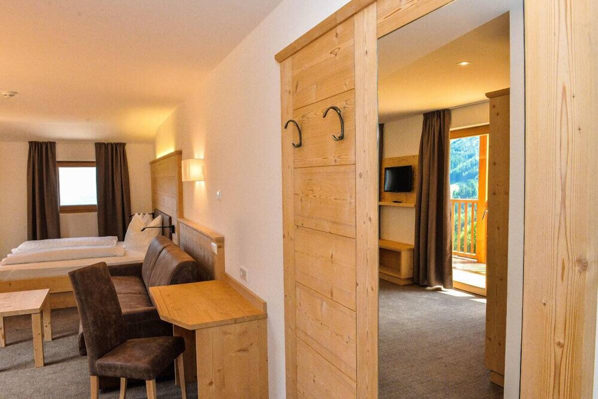 superior double room | in-room safe, desk, laptop workspace, blackout curtains