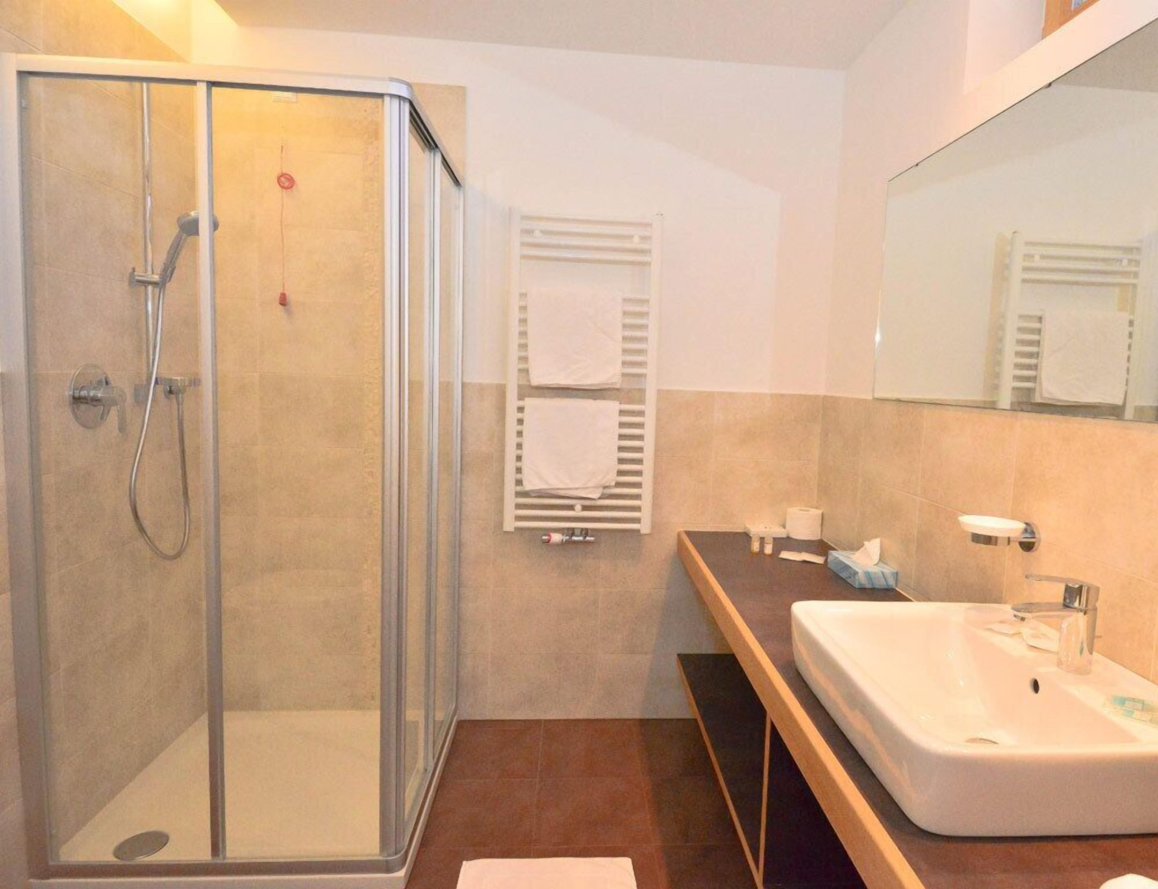 superior double room | bathroom | shower, free toiletries, hair dryer, slippers
