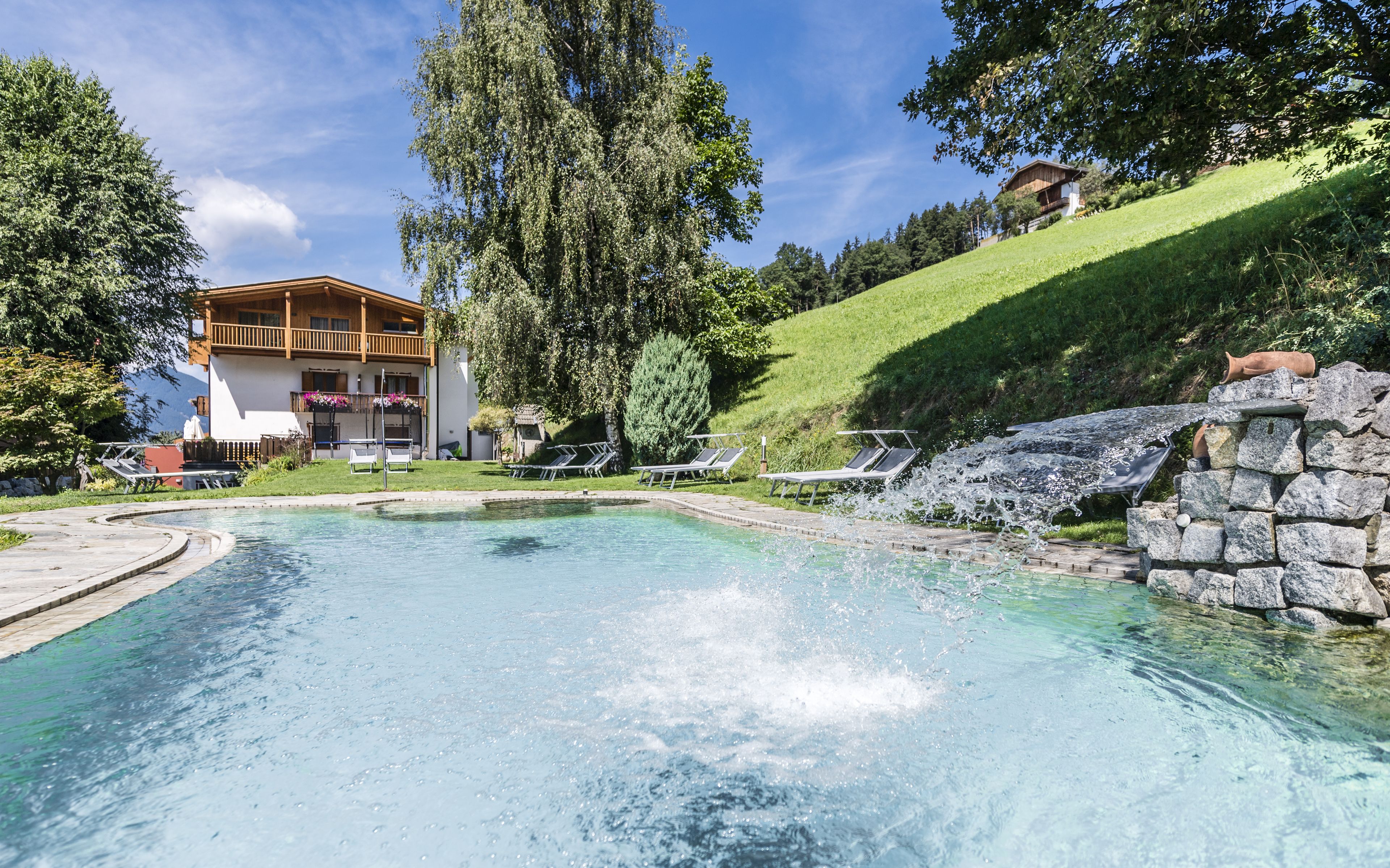 indoor pool, seasonal outdoor pool, pool umbrellas
