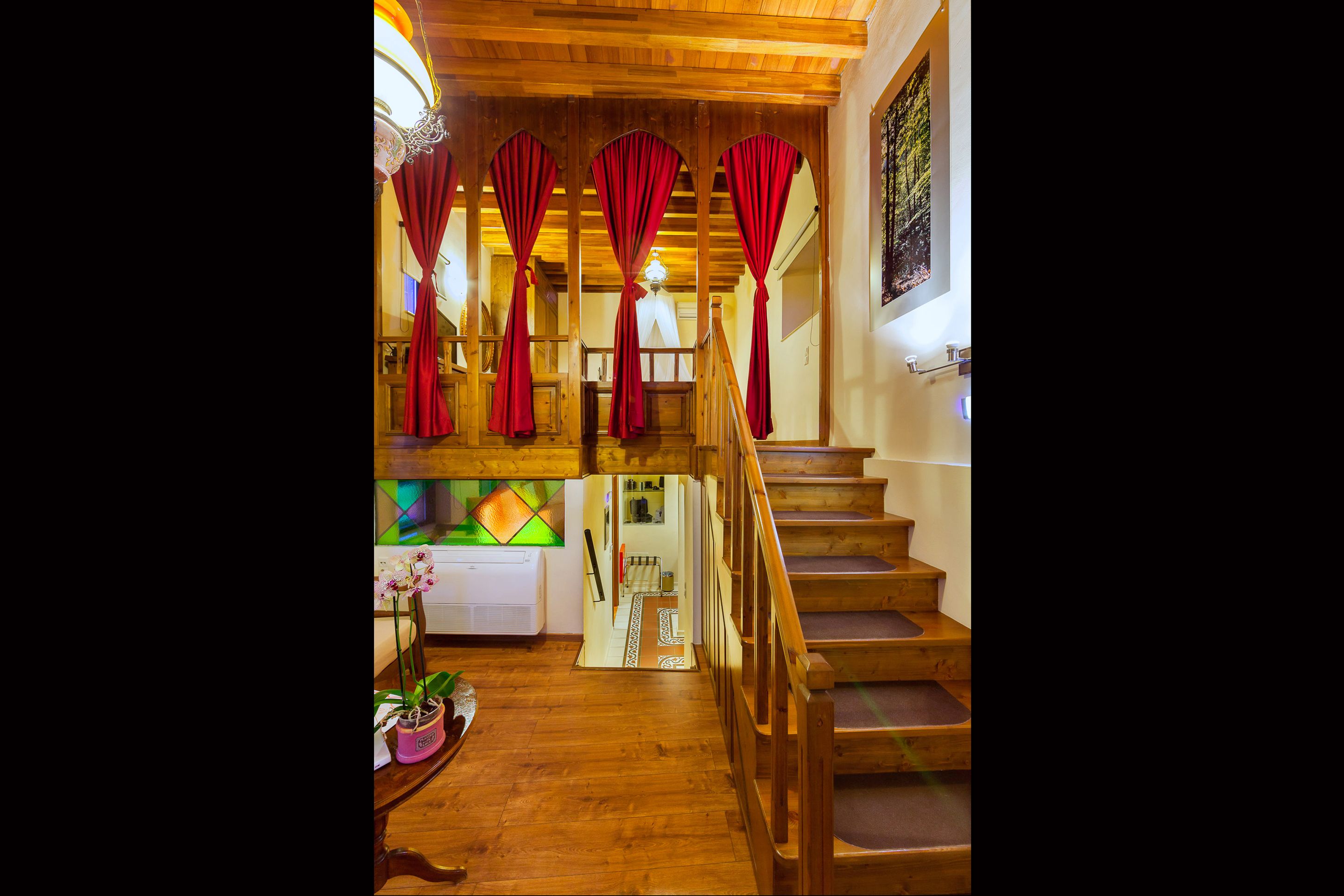 superior suite (nike of samothraki) | living room | 32-inch lcd tv with satellite channels, tv, books