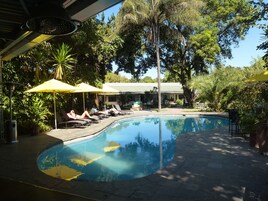 Outdoor pool, pool umbrellas, sun loungers