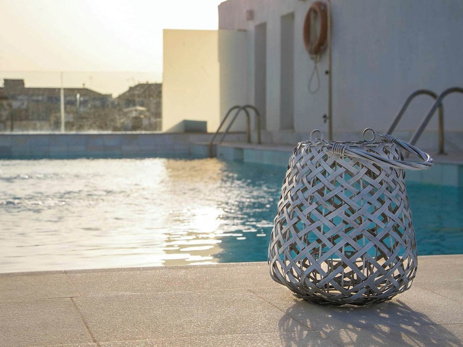 Seasonal outdoor pool, pool umbrellas, pool loungers