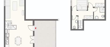 A floor plan of a hotel room with a kitchen area, a dining table, and a bathroom.