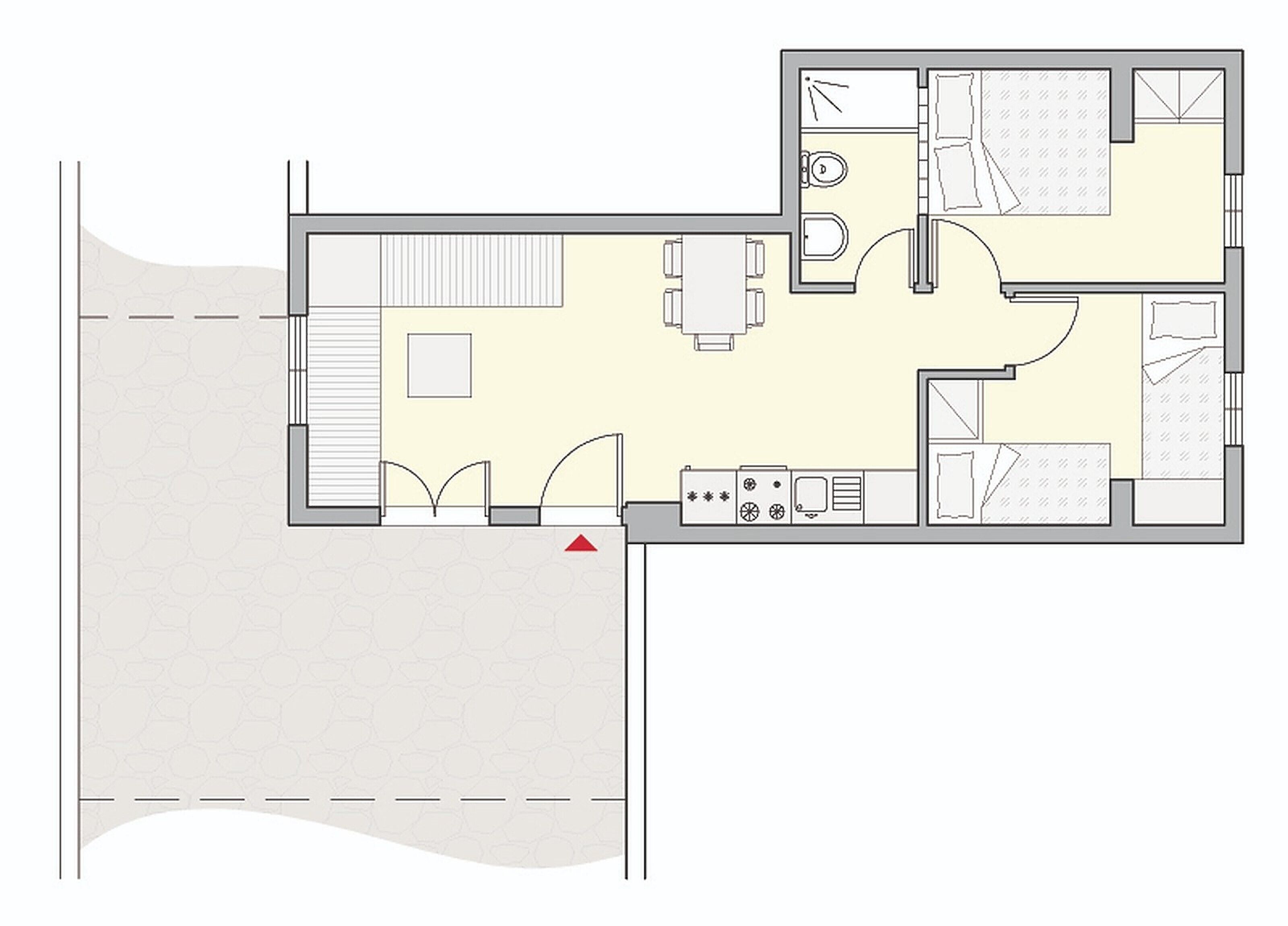 A floor plan of a hotel room with a bathroom, a kitchenette, a dining area, and a living space.
