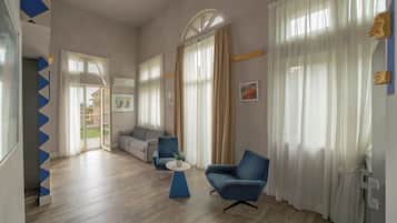 Exclusieve suite, 2 slaapkamers, uitzicht op meer | Luxe beddengoed, donsdekens, pillowtop-bedden, een minibar