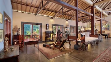Family Double Room, 2 Bedrooms, Partial Sea View, Mountainside | Living area | Flat-screen TV