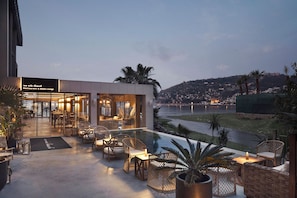 Breakfast, lunch, dinner served; international cuisine, beach views