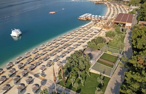 Private beach, free beach shuttle, beach cabanas, sun loungers