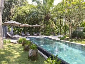 Outdoor pool, pool umbrellas, pool loungers