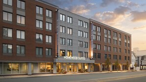 A multi-story hotel with a modern design, featuring a prominent 'Homewood Suites by Hilton' sign. - Homewood Suites by Hilton Boston Brookline-Longwood Medical (Brookline)