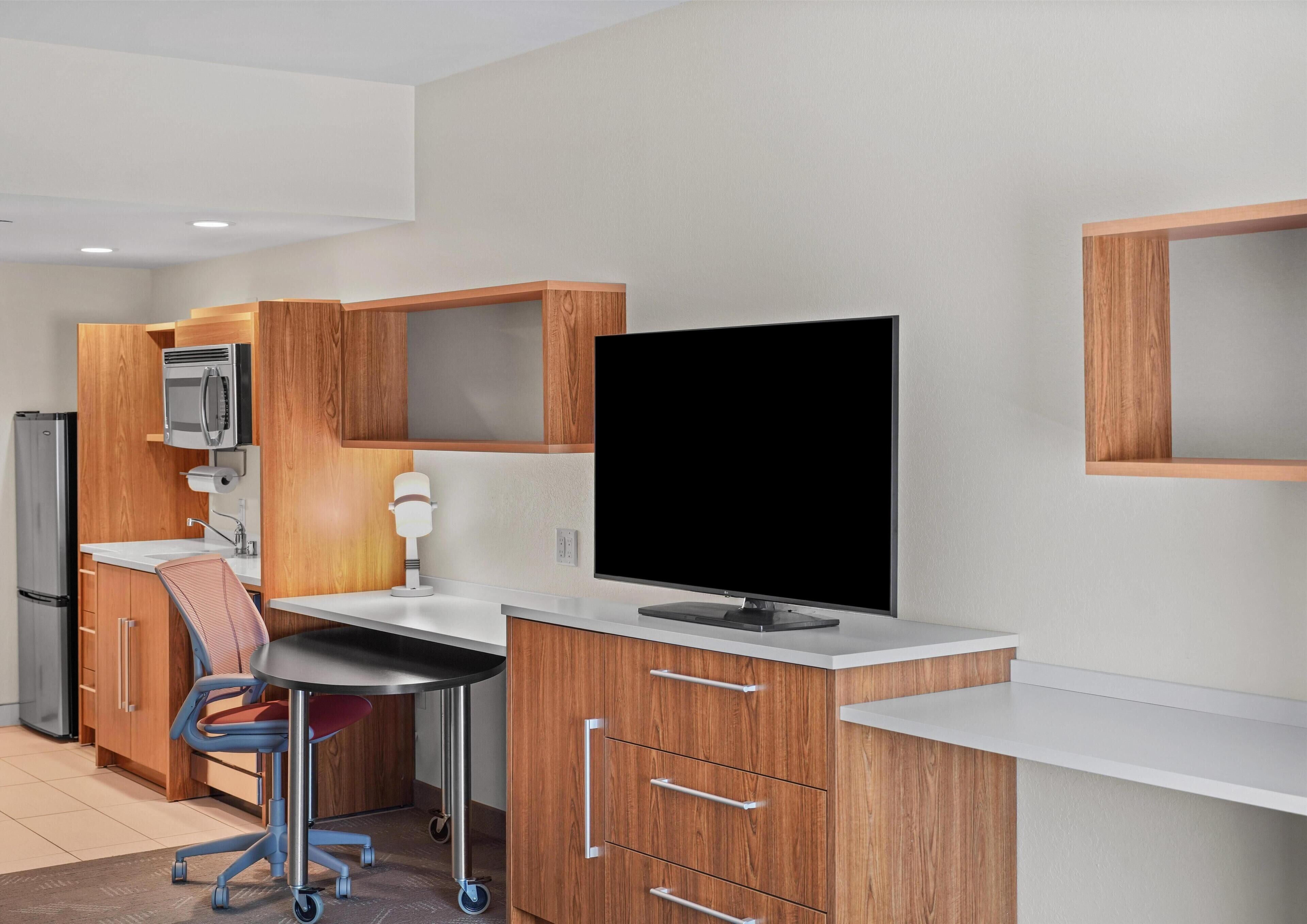 Desk, laptop workspace, blackout drapes, soundproofing