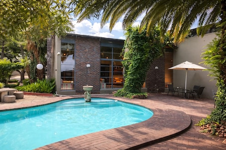 Outdoor pool. African Moon Corporate House
