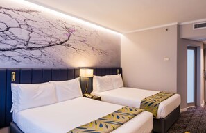 Standard Room, 2 Double Beds | In-room safe, desk, laptop workspace, blackout drapes